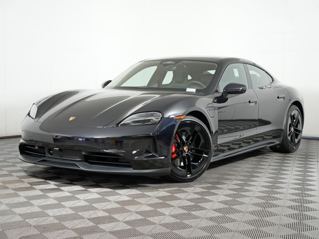 2026 Porsche Taycan 4S in Jet Black Metallic — front three-quarter view