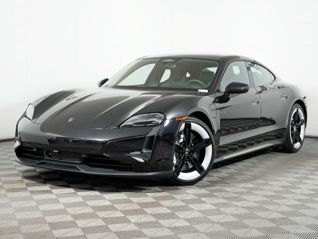 2026 Porsche Taycan Turbo in Jet Black Metallic — front three-quarter view