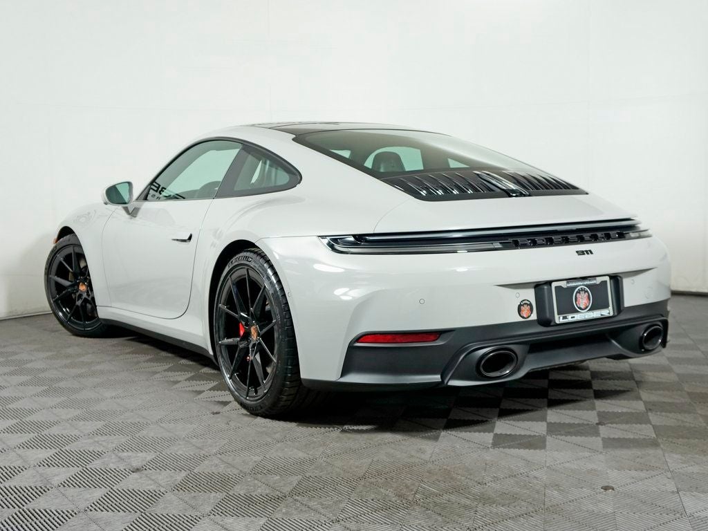 2026 Porsche 911 — rear three-quarter view