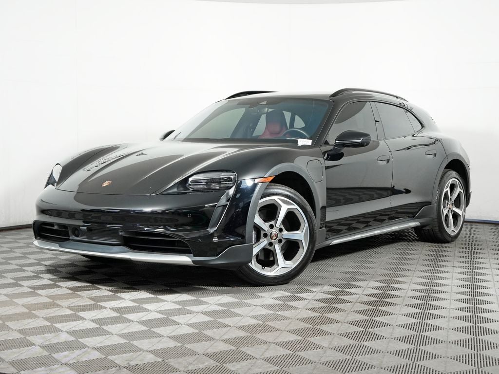 2024 Porsche Taycan 4 in Black — front three-quarter view