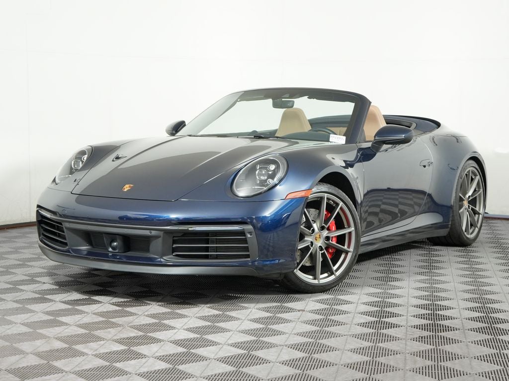 2020 Porsche 911 Carrera S in Night Blue Metallic — front three-quarter view