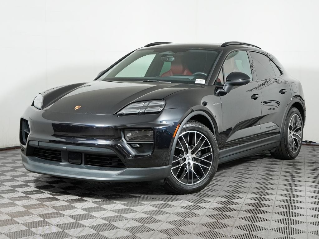 2025 Porsche Macan Electric 4 in Jet Black Metallic — front three-quarter view